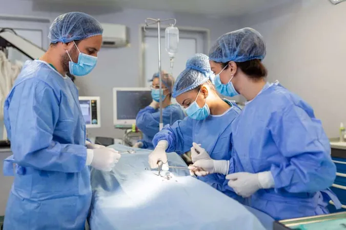 Surgeons Operating Lighting Equipment Male Female Doctors Are Wearing Blue Scrubs They Are Working Hospital X - American Board of Anesthesiology study guide