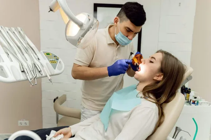 Highly Qualified Dentist Treats Teeth Young Patient Pain Free Dental Treatment Modern Dental Treatment Dentist Examines Problem Teeth X - American Board of Periodontology study guide