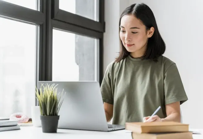 Woman Having Video Call Laptop 1 1 - AMCAT study guide