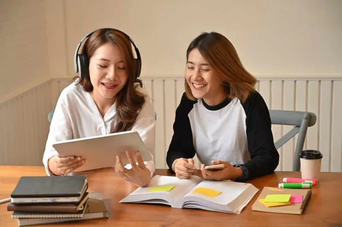 Female Together Using Tablet Talking With Education X - American Tutoring Association Certification study guide