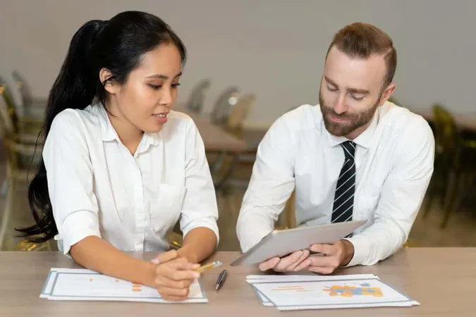 Positive Confident Interracial Colleagues Analyzing Online Data X - Asset Management Professional Certification study guide