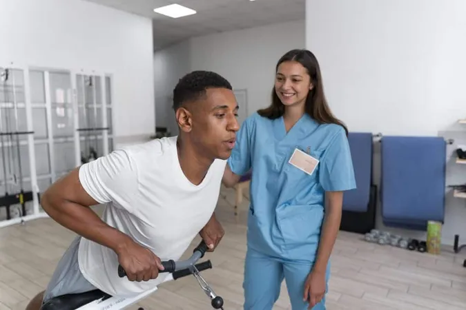 Medical Assistant Helping Patient With Physiotherapy Exercises X - AOTA Sensory Integration Certification study guide