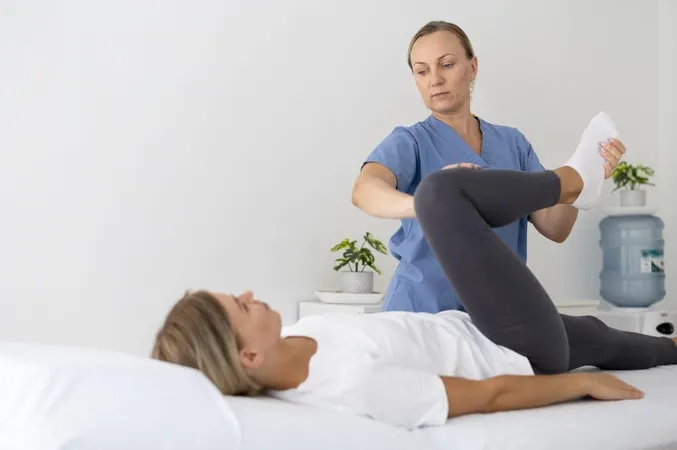 Physiotherapist Helping Young Female Patient Her Clinic X - Active Release Technique study guide
