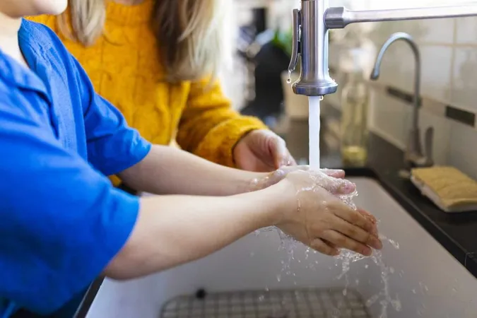 Boy Washing Hands New Normal X - American Water Works Association study guide