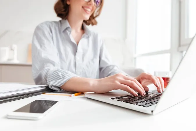 Brunette Woman Typing Email Lapt - Blog study guide