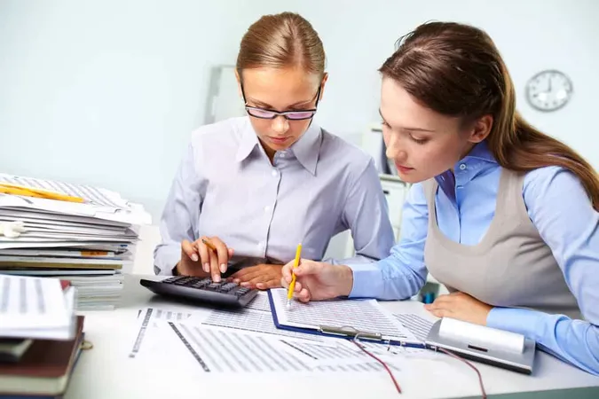 Businesswomen Reviewing Results 1 - Blog study guide