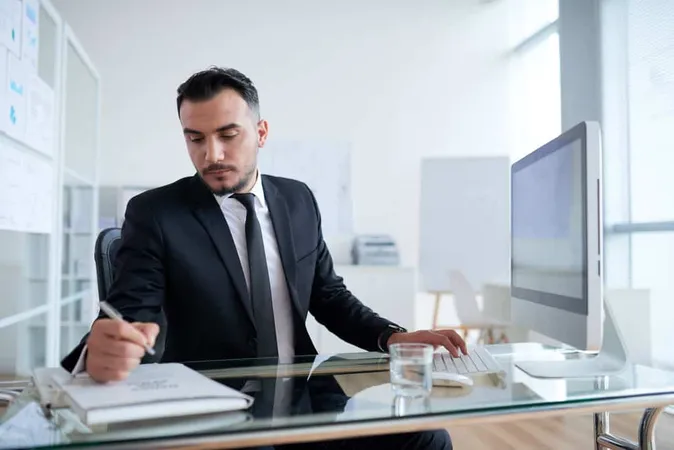 Caucasian Businessman Sitting De - Blog study guide