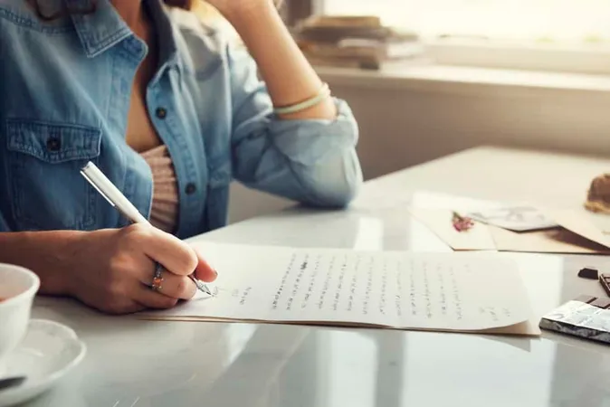 Caucasian Woman Writing Letter 1 - Blog study guide