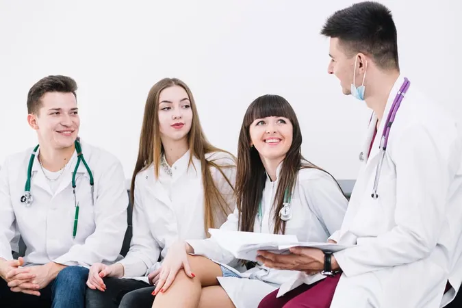 Cheerful Young Medics Sitting To - Blog study guide