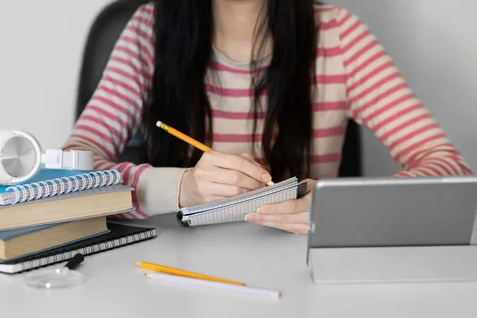 Close Up Woman Taking Notes 1 - Blog study guide