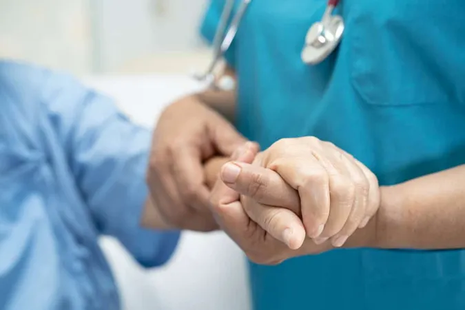 Doctor Holding Hand Asian Senior - Blog study guide