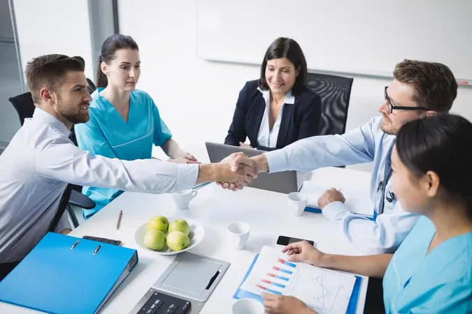 Doctors Shaking Hands With Each - Blog study guide