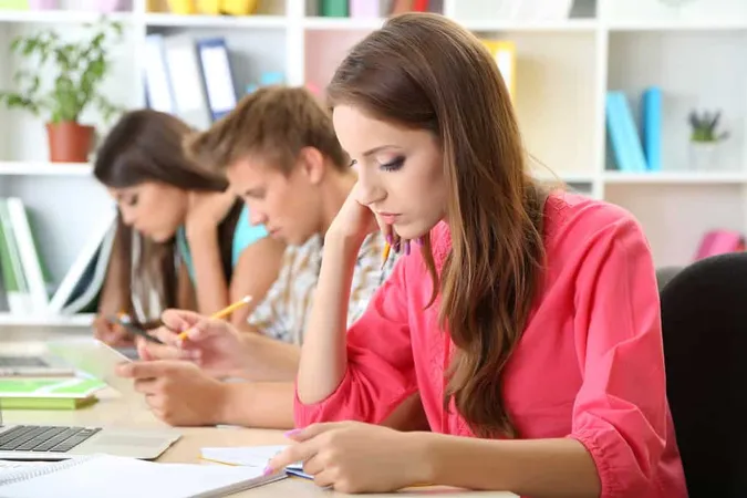 Group Young Students Sitting Lib - Blog study guide