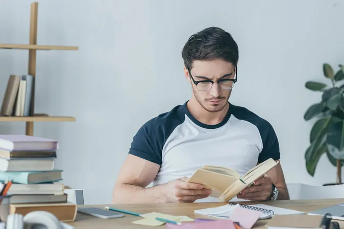 Handsome Male Student Reading Bo - Blog study guide