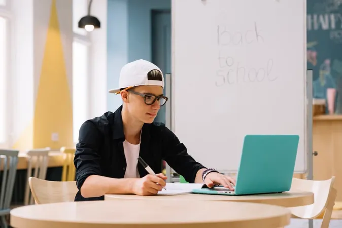Stylish Student Watching Laptop 1 - Blog study guide