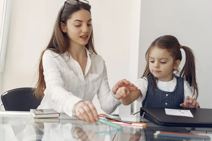 Tutor With Litthe Girl Studying - Blog study guide