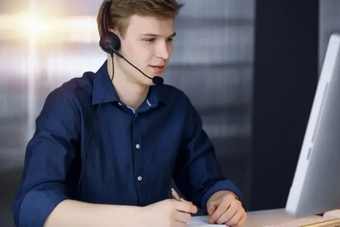 Young Blond Businessman Using He - Blog study guide