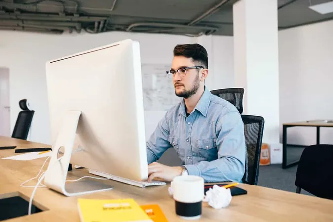Young Dark Haired Man Is Working - Blog study guide