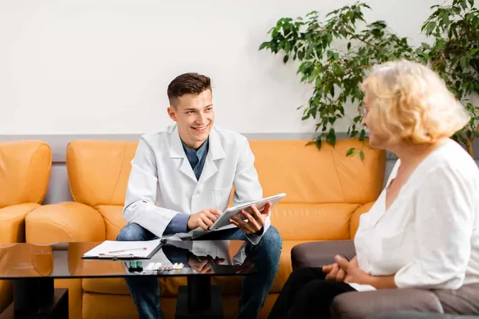 Young Doctor Holding Tablet Look - Blog study guide