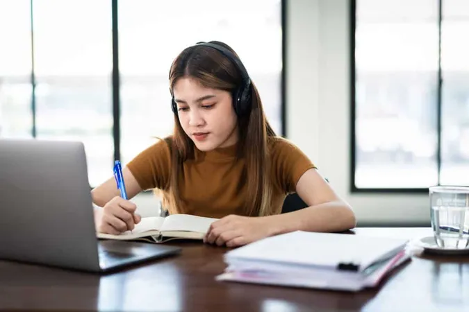 Young Woman Using Mobile Phone W - Blog study guide