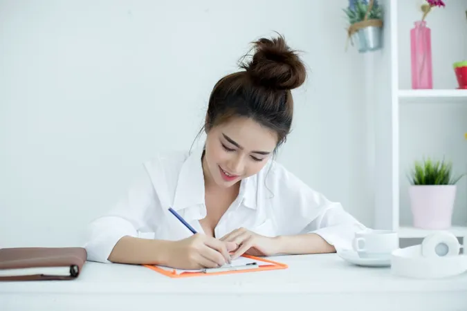 Beautiful Young Woman Working He - Blog study guide