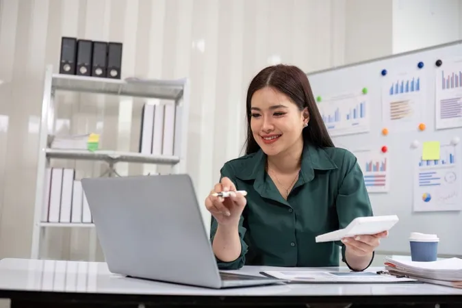 Young Accountant Analyzing Financial Documents Laptop Modern Office Setting With Charts Graphs Background X - Certified Accountant study guide