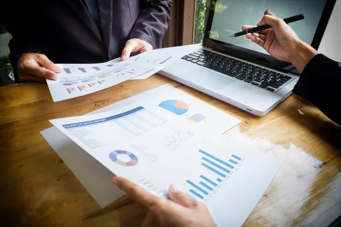 Business Team Working New Business Plan With Modern Digital Computer X - Certified Budget Specialist study guide