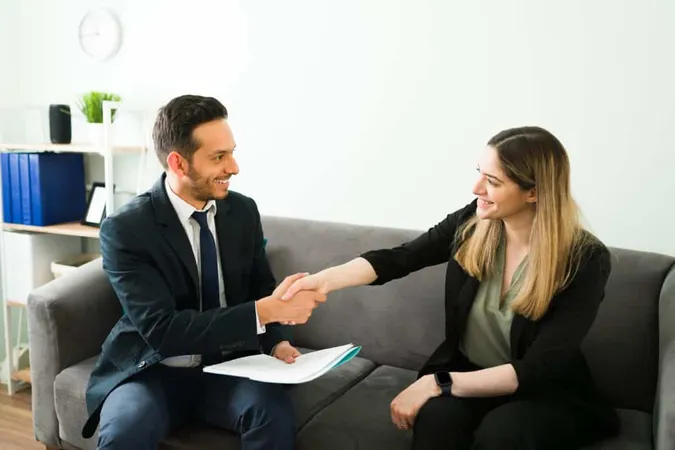 Handsome Businessman Shaking Hands With Beautiful Professional Colleague Making Deal Happy Coworkers Business Meeting Office X - Certified Credit Counselor study guide