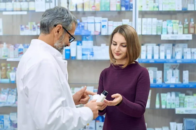 Pharmacist Helping Woman Medicine Choice - Certified Consultant Pharmacist study guide