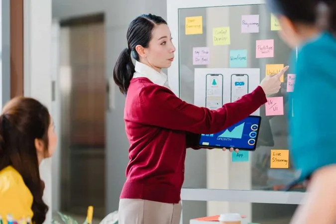 Group Asia Young Creative People Meeting Brainstorming Ideas Conducting Business Presentation Ideas Mobile Application Software Design Project Colleagues Modern Office Coworker Teamwork Concept 2 X - Certified Disciplined Agilist study guide