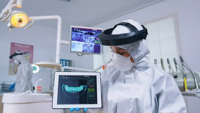 Patient Pov Listening Explication Teeth Treatment Dentist Coverall Showing X Ray Tablet Stomatology Specialist Wearing Protective Suit Against Infection With Covid19 Pointing Radiograph X - Certified Dental Coder study guide