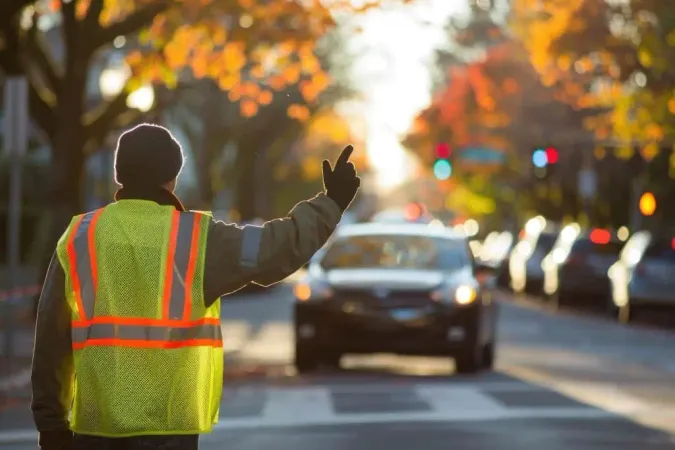 Traffic Warden Yellow Vest Signaling Cars Crosswalk X - Certified Driver Evaluation study guide