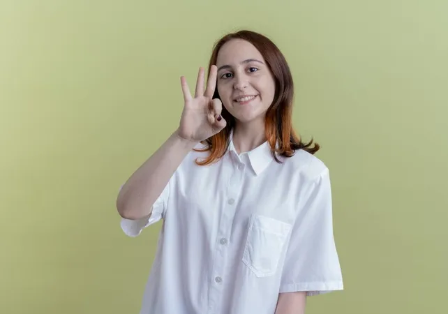 Smiling Young Redhead Girl Showing Okey Gesture Olive Green X - Certified Deaf Interpreter study guide