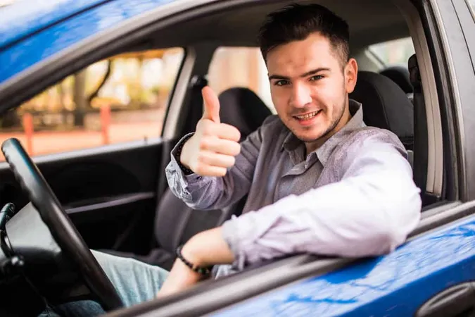 Happy Smiling Man Sitting Inside 1 - CDL study guide