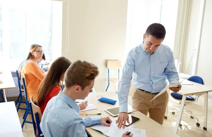 Education School Learning People Concept Group Students Teacher With Test Results Classroom X - Certified Educational Planner study guide