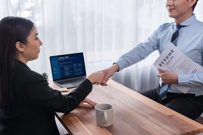 Happy Business People Shake Hands After Successful Interview Jubilant - Certified Employment Support Professional study guide