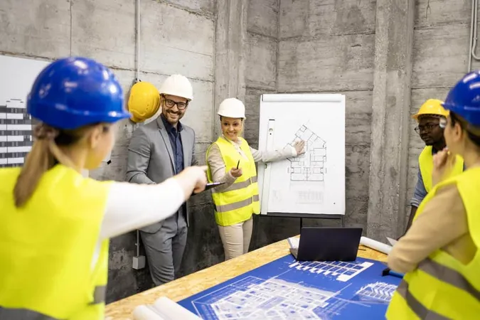 Engineers Architects Having Meeting Construction Site Analyzing Phase Building X - Construction Industry Training Board study guide