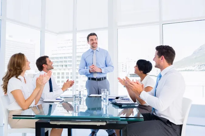 Executives Clapping Around Conference Table X - Certified Leadership Coach study guide