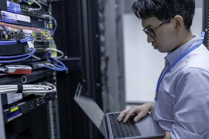 Computer Engineer Is Setting Up Network Server Roomsystems Maintenance Technicianmale Engineer Working Server Room Modern Data Center X - CompTIA Network+ study guide