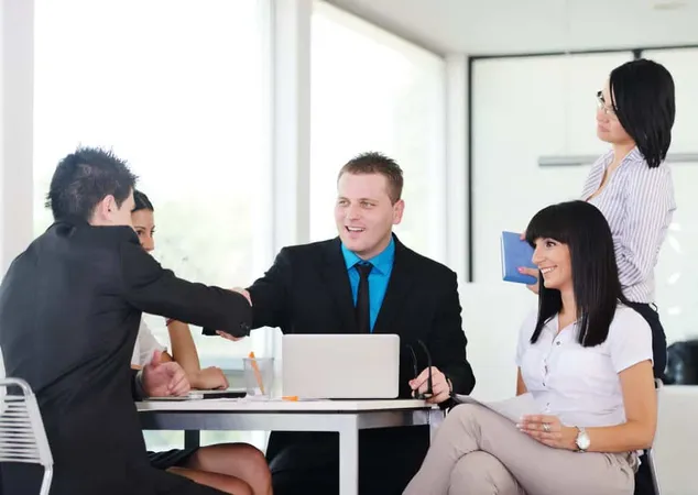 Happy Business People Shaking Hands Deal Smiling Working Table X - Public-Private Partnership Certification study guide