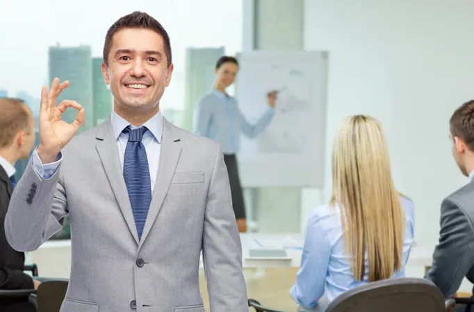 Business People Gesture Success Concept Happy Smiling Businessman Suit With Team Office Room Background Showing Ok Hand Sign X - Certified Professional Career Coach study guide