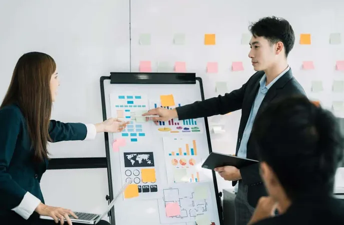 Group Business Asian Financial Advisors Sitting Table Listening Their Manager Meeting Office Morning X - Certified Project Manager study guide