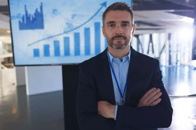 Male Speaker Standing With Arms Crossed Business Seminar X - Chief Risk Officer Certification study guide