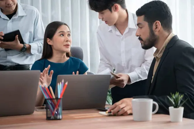 Asian Office Workers Office Discussing Working Together Concord 1 X - Certified Senior Consultant study guide