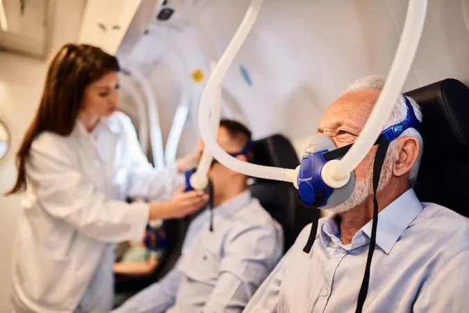 Senior Man Breathing Through Mask Oxygen Therapy Hyperbaric Chamber X - Conscious Sedation Certification study guide