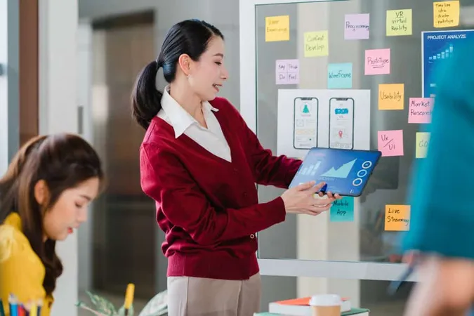 Group Asia Young Creative People Meeting Brainstorming Ideas Conducting Business Presentation Ideas Mobile Application Software Design Project Colleagues Modern Office Coworker Teamwork Concept 1 X - Certified ScrumMaster study guide