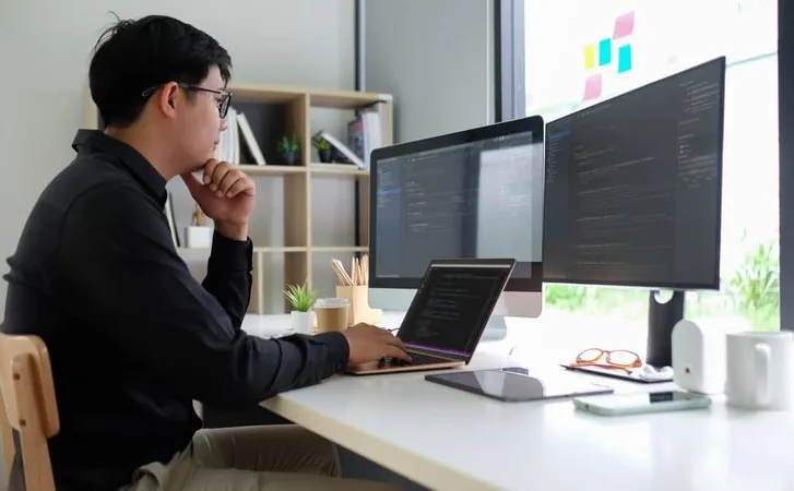 Side View Senior Man Using Laptop X - Certified Software Manager study guide