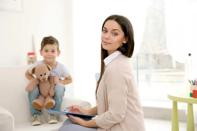 Young Child Psychologist Working With Little Boy X - Childhood Trauma Consultant Certified study guide