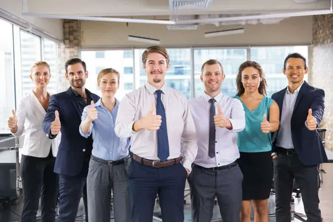 Business People Standing Row With Thumbs Up X - Certified Team Leader study guide