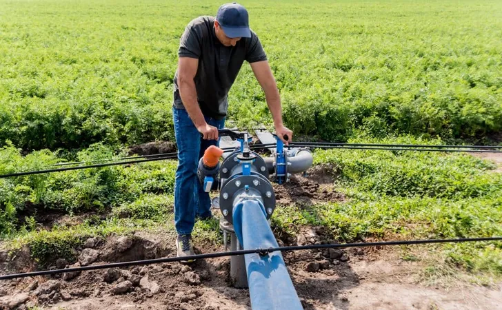 Drip Irrigation System Water Saving Drip Irrigation System Being Used Young Carrot Field Worker Opens Tap 1 X - Certified Well Driller study guide